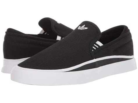 original adidas slip ins black|black Adidas slip on shoes.